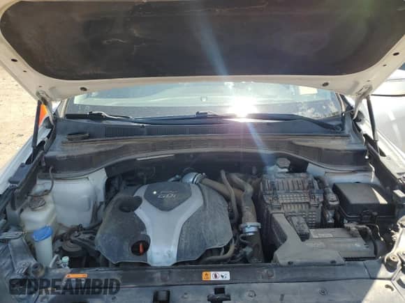 2014 Hyundai Santa Fe z VIN 5XYZW3LA2EG170485, wystawiony jako Copart lot #64200015 z przebiegiem 152 769 mil mil oraz Szkoda całkowita • Salvage title. Historia ofert i sprzedaży dostępna na DreamBid. Obrazek 12.