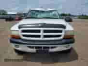 2003 Dodge Dakota Sport z VIN 1D7HG32NX3S345172, wystawiony jako Copart lot #65775335 z przebiegiem 169 253 mil mil oraz Szkoda całkowita • Salvage title. Historia ofert i sprzedaży dostępna na DreamBid. Obrazek 5.