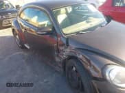 ✅ 2013 Volkswagen Beetle 2.5L • VIN: 3VWJP7AT4DM613997 • Lot: 41290895. Listed on IAAI with 187,060 mi. Free auction sales archive from the USA and detailed vehicle history report at DreamBid. Image 6.