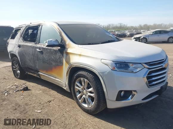 2020 Chevrolet Traverse High Country z VIN 1GNEVNKWXLJ178011, wystawiony jako IAAI lot #42091608 z przebiegiem 62 035 mil mil oraz . Historia ofert i sprzedaży dostępna na DreamBid. Obrazek 1.