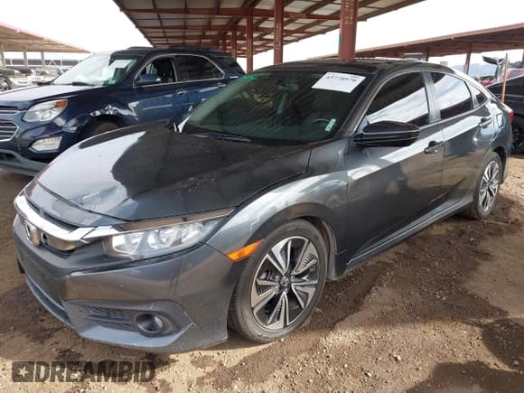 ✅ 2018 Honda Civic EX-T • VIN: JHMFC1F35JX021667 • Lot: 43778970. Listed on IAAI with 159,063 mi. Free auction sales archive from the USA and detailed vehicle history report at DreamBid. Image 2.