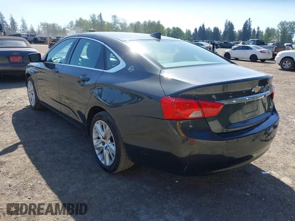 ✅ 2015 Chevrolet Impala LS • VIN: 2G11Z5SL9F9142689 • Lot: 42153264. Listed on IAAI with 62,937 mi. Free auction sales archive from the USA and detailed vehicle history report at DreamBid. Image 3.