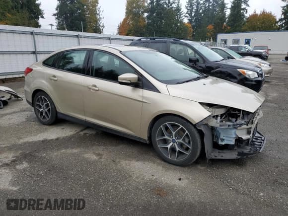 ✅ 2018 Ford Focus SEL • VIN: 1FADP3H27JL217474 • Lot: 90101065. Wystawiony na Copart z przebiegiem 87 210 mil. Bezpłatny archiwum sprzedaży aukcyjnych z USA i szczegółowy raport historii pojazdu na DreamBid. Zdjęcie 4.