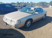✅ 1997 Cadillac Eldorado • VIN: 1G6EL12Y4VU602876 • Lot: 43239613. Listed on IAAI with 79,117 mi. Free auction sales archive from the USA and detailed vehicle history report at DreamBid. Image 2.