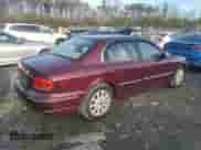 2003 Hyundai Sonata GLS z VIN KMHWF35HX3A907051, wystawiony jako Copart lot #84613894 z przebiegiem 197 439 mil mil oraz Szkoda całkowita • Salvage title. Historia ofert i sprzedaży dostępna na DreamBid. Obrazek 3.