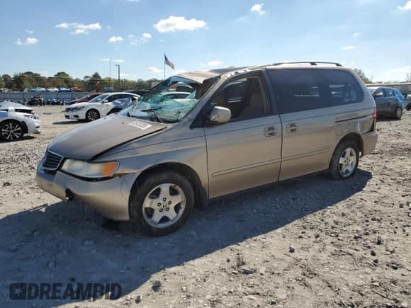 ✅ 2001 Honda Odyssey EX • VIN: 2HKRL18621H548812 • Лот: 90939335. Опубликован ранее на Copart с пробегом 365 349 миль. Бесплатный доступ к архиву аукционных продаж из США и подробный отчёт об истории автомобиля на DreamBid. Изображение 1.