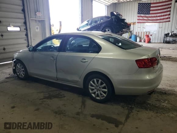 ✅ 2011 Volkswagen Jetta SE • VIN: 3VWDZ7AJ0BM338079 • Lot: 58900585. Listed on Copart with 165,055 mi. Free auction sales archive from the USA and detailed vehicle history report at DreamBid. Image 2.