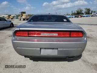 ✅ 2013 Dodge Challenger SXT • VIN: 2C3CDYAG8DH704836 • Lot: 78391164. Wystawiony na Copart z przebiegiem 167 289 mil. Bezpłatny archiwum sprzedaży aukcyjnych z USA i szczegółowy raport historii pojazdu na DreamBid. Zdjęcie 6.