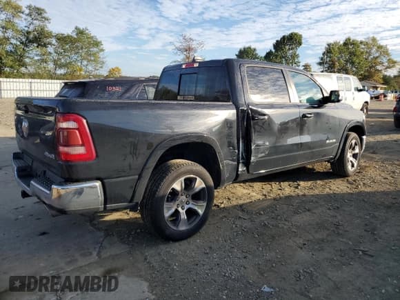 ✅ 2021 Ram 1500 Laramie • VIN: 1C6SRFJT3MN676601 • Лот: 84864265. Опубликован ранее на Copart с пробегом 124 485 миль. Бесплатный доступ к архиву аукционных продаж из США и подробный отчёт об истории автомобиля на DreamBid. Изображение 3.