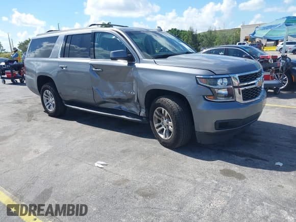 ✅ 2020 Chevrolet Suburban LT • VIN: 1GNSCHKC4LR302047 • Lot: 42518927. Listed on IAAI with 105,760 mi. Free auction sales archive from the USA and detailed vehicle history report at DreamBid. Image 1.