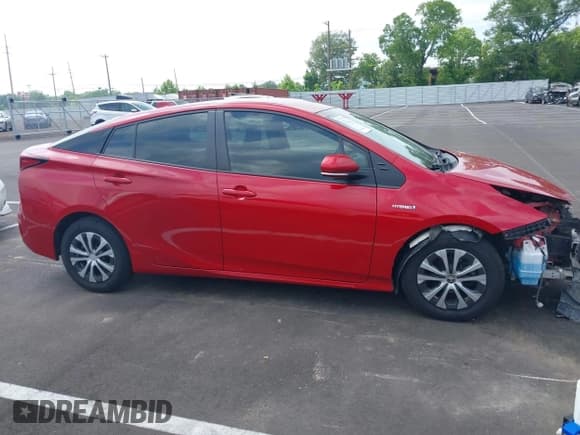 ✅ 2021 Toyota Prius LE • VIN: JTDL9MFU0M3029880 • Lot: 42450003. Listed on IAAI with 91,558 mi. Free auction sales archive from the USA and detailed vehicle history report at DreamBid. Image 13.