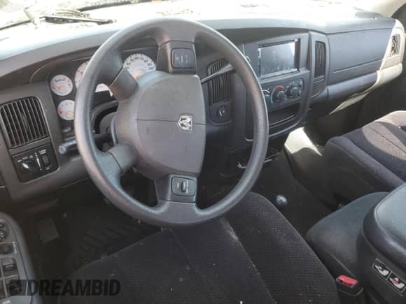 2005 Dodge 1500 SLT с VIN 1D7HU18D05S287085, выставлен на аукционе Copart как лот 59259574 с пробегом Не указан миль и Списание • Salvage title. История ставок и продаж доступна на DreamBid. Изображение 8.