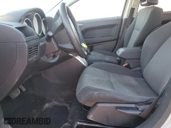 ✅ 2009 Dodge Caliber SXT • VIN: 1B3HB48A49D220914 • Лот: 87677285. Опубликован ранее на Copart с пробегом 218 324 миль. Бесплатный доступ к архиву аукционных продаж из США и подробный отчёт об истории автомобиля на DreamBid. Изображение 7.