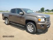 ✅ 2015 GMC Canyon 2WD SLE • VIN: 1GTG5BE32F1138155 • Lot: 64965195. Wystawiony na Copart z przebiegiem 77 566 mil. Bezpłatny archiwum sprzedaży aukcyjnych z USA i szczegółowy raport historii pojazdu na DreamBid. Zdjęcie 4.