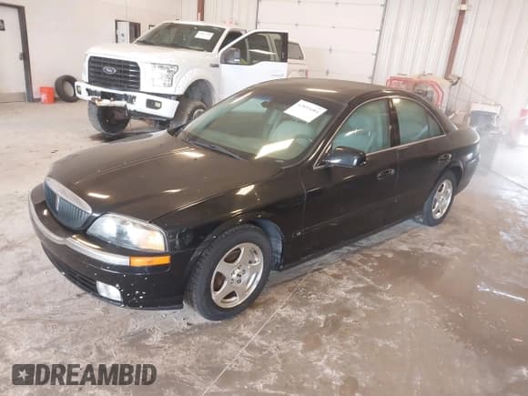 ✅ 2000 Lincoln LS • VIN: 1LNHM87A0YY767862 • Лот: 42893684. Опубликован ранее на IAAI с пробегом 54 280 миль. Бесплатный доступ к архиву аукционных продаж из США и подробный отчёт об истории автомобиля на DreamBid. Изображение 2.