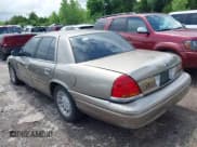 ✅ 2002 Ford Crown Victoria LX • VIN: 2FAFP74W52X112493 • Лот: 42197164. Опубликован ранее на IAAI с пробегом 103 941 миль. Бесплатный доступ к архиву аукционных продаж из США и подробный отчёт об истории автомобиля на DreamBid. Изображение 3.