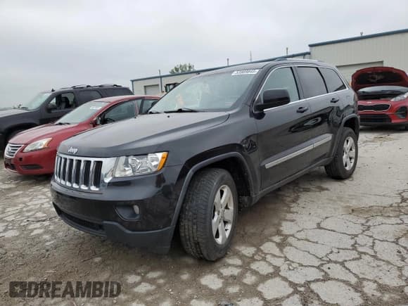 ✅ 2011 Jeep Grand Cherokee Laredo • VIN: 1J4RR4GG2BC662746 • Lot: 53989845. Listed on Copart with 138,402 mi. Free auction sales archive from the USA and detailed vehicle history report at DreamBid. Image 1.