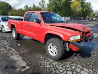 ✅ 2002 Dodge Dakota Sport • VIN: 1B7GG32N22S510037 • Lot: 77149424. Wystawiony na Copart z przebiegiem 91 256 mil. Bezpłatny archiwum sprzedaży aukcyjnych z USA i szczegółowy raport historii pojazdu na DreamBid. Zdjęcie 4.