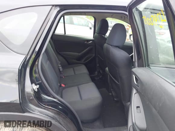 ✅ 2014 Mazda CX-5 Sport • VIN: JM3KE4BE4E0399648 • Lot: 42452015. Listed on IAAI with 105,621 mi. Free auction sales archive from the USA and detailed vehicle history report at DreamBid. Image 8.