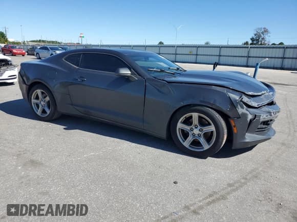 ✅ 2016 Chevrolet Camaro 1LT • VIN: 1G1FB1RS6G0169702 • Lot: 82486755. Listed on Copart with 131,243 mi. Free auction sales archive from the USA and detailed vehicle history report at DreamBid. Image 4.