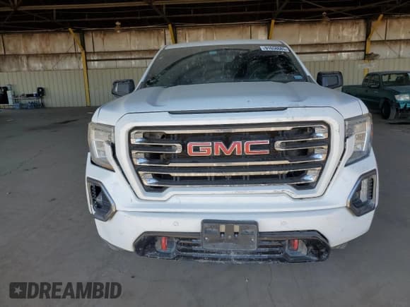 ✅ 2021 GMC Sierra 1500 AT4 • VIN: 3GTP9EED5MG119418 • Лот: 91658685. Опубликован ранее на Copart с пробегом 119 799 миль. Бесплатный доступ к архиву аукционных продаж из США и подробный отчёт об истории автомобиля на DreamBid. Изображение 5.
