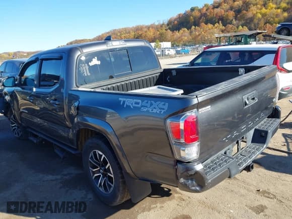 ✅ 2020 Toyota Tacoma SR5 • VIN: 3TMCZ5AN4LM295938 • Lot: 40692316. Listed on IAAI with 75,714 mi. Free auction sales archive from the USA and detailed vehicle history report at DreamBid. Image 3.