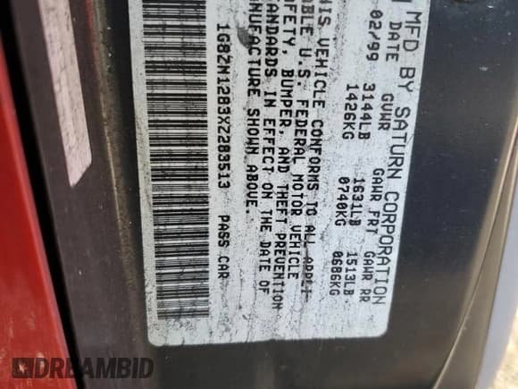 ✅ 1999 Saturn SC • VIN: 1G8ZN1283XZ283513 • Лот: 41760055. Опубликован ранее на Copart с пробегом Не указан. Бесплатный доступ к архиву аукционных продаж из США и подробный отчёт об истории автомобиля на DreamBid. Изображение 13.