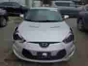 2012 Hyundai Veloster w/Red Int z VIN KMHTC6AD2CU021143, wystawiony jako Copart lot #44055345 z przebiegiem Nie podano mil oraz Czysty tytuł • Clean title. Historia ofert i sprzedaży dostępna na DreamBid. Obrazek 5.