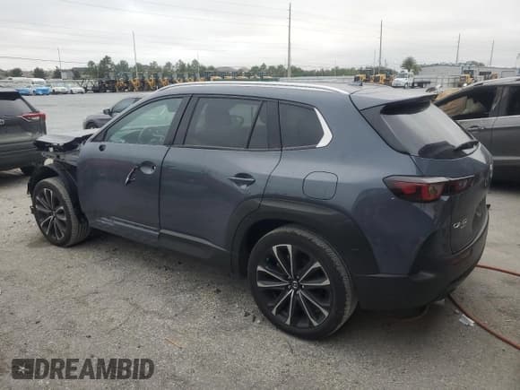 ✅ 2025 Mazda CX-50 S Premium Plus • VIN: 7MMVABEM7SN330119 • Lot: 85702725. Listed on Copart with 9,960 mi. Free auction sales archive from the USA and detailed vehicle history report at DreamBid. Image 2.