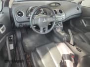 ✅ 2006 Mitsubishi Eclipse GT • VIN: 4A3AK34T96E017988 • Лот: 81120495. Опубликован ранее на Copart с пробегом 146 308 миль. Бесплатный доступ к архиву аукционных продаж из США и подробный отчёт об истории автомобиля на DreamBid. Изображение 8.