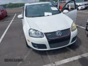 ✅ 2009 Volkswagen Golf GTI • VIN: WVWHD91K59W034022 • Лот: 42900103. Опубликован ранее на IAAI с пробегом 167 017 миль. Бесплатный доступ к архиву аукционных продаж из США и подробный отчёт об истории автомобиля на DreamBid. Изображение 6.
