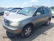 ✅ 2003 Lexus RX 300 • VIN: JTJHF10U030295855 • Lot: 42532724. Listed on IAAI with 173,460 mi. Free auction sales archive from the USA and detailed vehicle history report at DreamBid. Image 2.