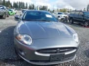 ✅ 2007 Jaguar XK • VIN: SAJWA43B675B17854 • Lot: 42003478. Listed on IAAI with 64,149 mi. Free auction sales archive from the USA and detailed vehicle history report at DreamBid. Image 12.