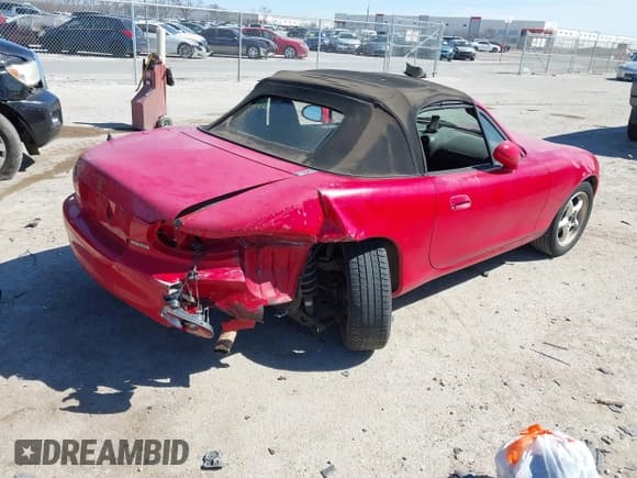 ✅ 2001 Mazda MX-5 Miata • VIN: JM1NB353910201434 • Lot: 41817576. Listed on IAAI with 209,104 mi. Free auction sales archive from the USA and detailed vehicle history report at DreamBid. Image 4.