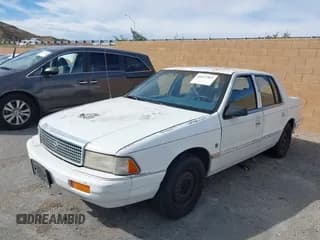 ✅ 1991 Plymouth Acclaim • VIN: 1P3XA4634MF582546 • Lot: 41657565. Wystawiony na IAAI z przebiegiem 85 985 mil. Bezpłatny archiwum sprzedaży aukcyjnych z USA i szczegółowy raport historii pojazdu na DreamBid. Zdjęcie 2.