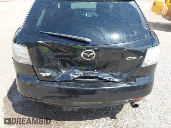 ✅ 2012 Mazda CX-7 i Touring • VIN: JM3ER2CM5C0415574 • Lot: 42263702. Wystawiony na IAAI z przebiegiem 293 566 mil. Bezpłatny archiwum sprzedaży aukcyjnych z USA i szczegółowy raport historii pojazdu na DreamBid. Zdjęcie 6.