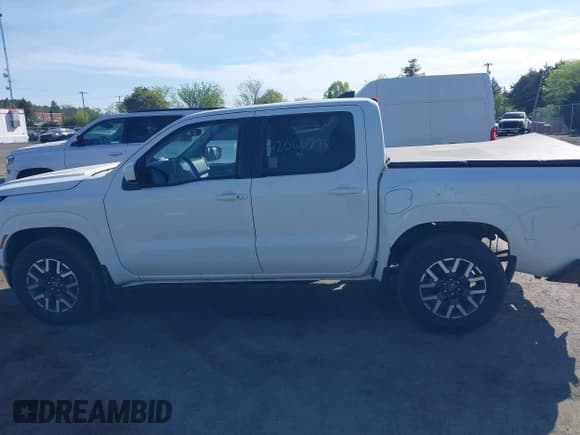 ✅ 2024 Nissan Frontier SV • VIN: 1N6ED1EKXRN665480 • Lot: 42060798. Listed on IAAI with 4,245 mi. Free auction sales archive from the USA and detailed vehicle history report at DreamBid. Image 14.