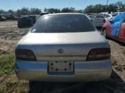 ✅ 1996 Nissan Altima XE • VIN: 1N4BU31D0TC157956 • Lot: 80838464. Listed on Copart with 132,503 mi. Free auction sales archive from the USA and detailed vehicle history report at DreamBid. Image 6.