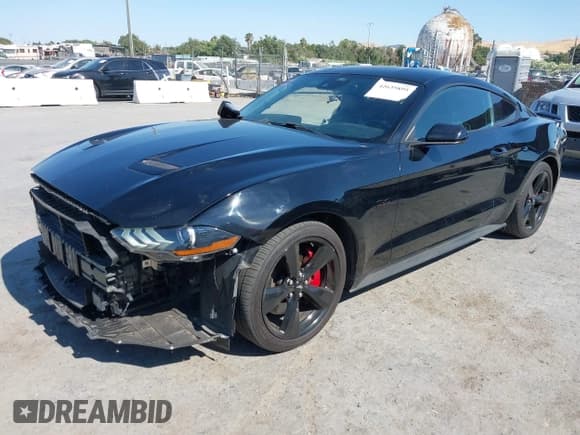 ✅ 2021 Ford Mustang GT • VIN: 1FA6P8CFXM5138390 • Lot: 42635895. Listed on IAAI with 59,184 mi. Free auction sales archive from the USA and detailed vehicle history report at DreamBid. Image 19.