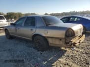 ✅ 2005 Ford Police Interceptor • VIN: 2FAFP71W95X164931 • Lot: 90994005. Listed on Copart with 168,289 mi. Free auction sales archive from the USA and detailed vehicle history report at DreamBid. Image 2.