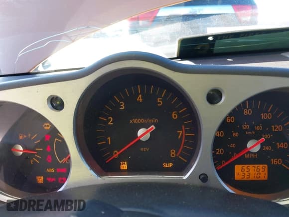 ✅ 2004 Nissan 350Z Touring • VIN: JN1AZ36A24T000472 • Lot: 38684053. Listed on IAAI with 65,769 mi. Free auction sales archive from the USA and detailed vehicle history report at DreamBid. Image 7.