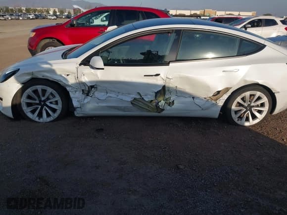 ✅ 2021 Tesla Model 3 Long Range • VIN: 5YJ3E1EB0MF936609 • Lot: 41599411. Listed on IAAI with 55,993 mi. Free auction sales archive from the USA and detailed vehicle history report at DreamBid. Image 6.