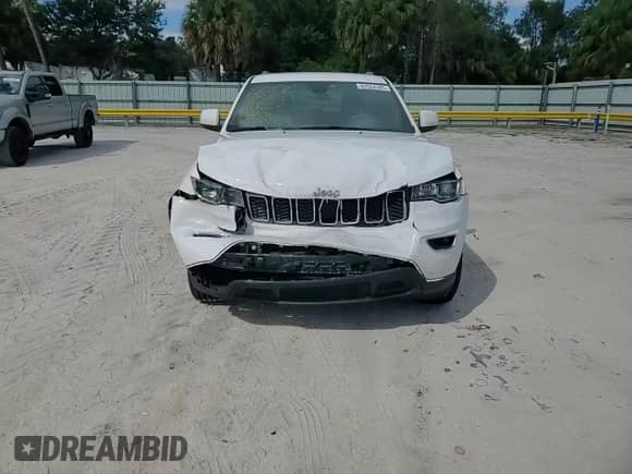 2021 Jeep Grand Cherokee Laredo E с VIN 1C4RJEAG3MC783915, выставлен на аукционе Copart как лот 82524365 с пробегом 82 076 миль миль и На запчасти • Non repairable. История ставок и продаж доступна на DreamBid. Изображение 14.