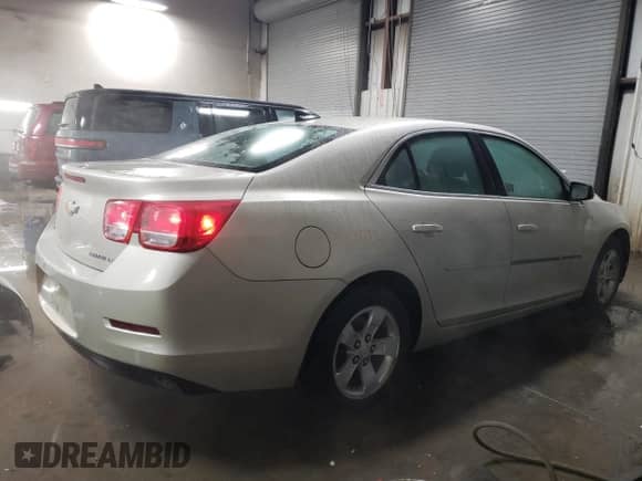 2015 Chevrolet Malibu LS with VIN 1G11B5SL9FF212283, listed as a Copart auction lot 83877934 with 55,681 mi miles and Salvage title. Bid and sale history available at DreamBid. Image 3.