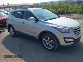 2015 Hyundai Santa Fe z VIN 5XYZWDLA6FG255708, wystawiony jako IAAI lot #42417177 z przebiegiem 127 639 mil mil oraz . Historia ofert i sprzedaży dostępna na DreamBid. Obrazek 1.