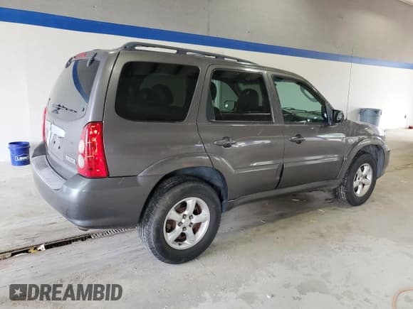 ✅ 2005 Mazda Tribute S • VIN: 4F2CZ96115KM59847 • Lot: 67740144. Listed on Copart with 217,053 mi. Free auction sales archive from the USA and detailed vehicle history report at DreamBid. Image 3.
