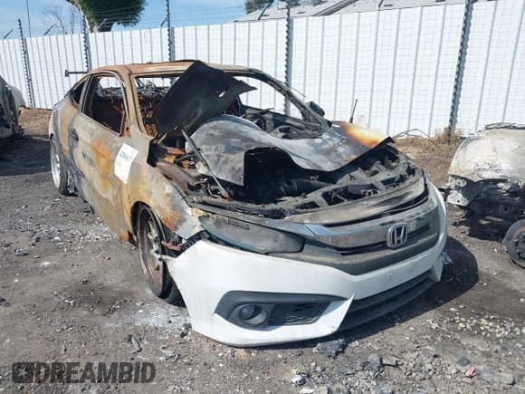 ✅ 2017 Honda Civic Touring • VIN: 2HGFC3B93HH356448 • Lot: 42068417. Listed on IAAI with Not provided. Free auction sales archive from the USA and detailed vehicle history report at DreamBid. Image 1.