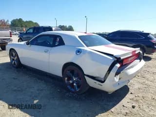 ✅ 2013 Dodge Challenger SXT • VIN: 2C3CDYAG6DH737253 • Lot: 40615411. Wystawiony na IAAI z przebiegiem 133 973 mil. Bezpłatny archiwum sprzedaży aukcyjnych z USA i szczegółowy raport historii pojazdu na DreamBid. Zdjęcie 3.