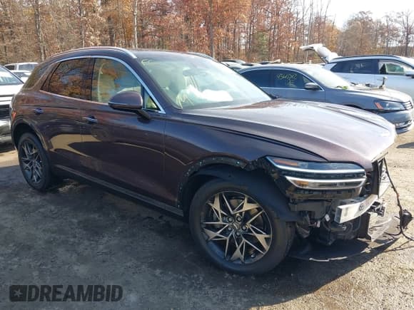 ✅ 2022 Genesis GV70 2.5T • VIN: KMUMADTB7NU038759 • Лот: 43616035. Опубликован ранее на IAAI с пробегом 52 188 миль. Бесплатный доступ к архиву аукционных продаж из США и подробный отчёт об истории автомобиля на DreamBid. Изображение 1.