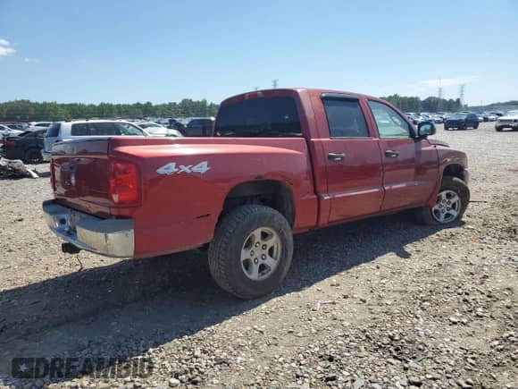 2006 Dodge Dakota SLT z VIN 1D7HW48K76S536008, wystawiony jako Copart lot #62453804 z przebiegiem Nie podano mil oraz Szkoda całkowita • Salvage title. Historia ofert i sprzedaży dostępna na DreamBid. Obrazek 3.